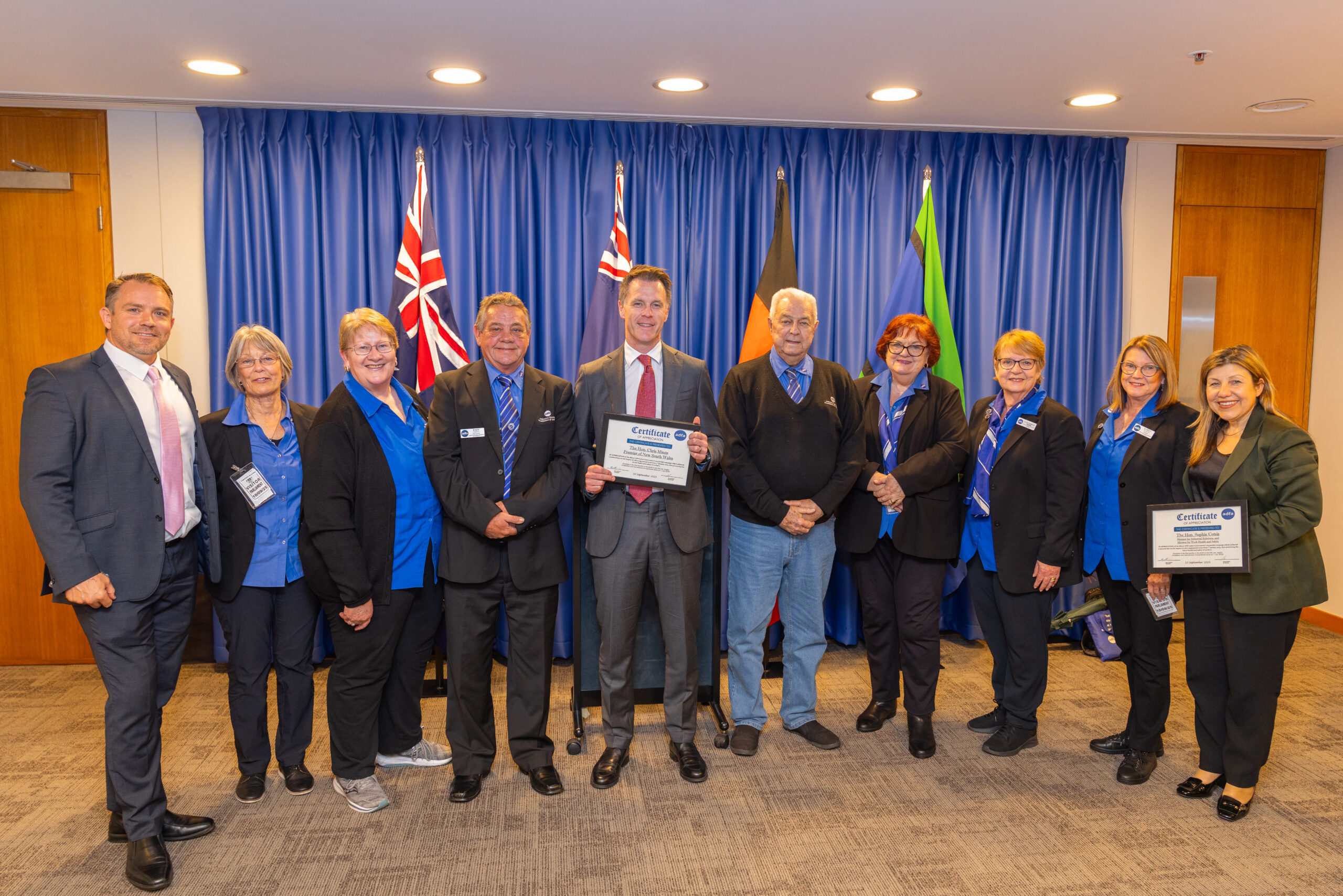 Combined Demolition Services CEO Ben Bailey joined John Limpus (Founder, About the House) and representatives from the Asbestos Diseases Foundation of Australia (ADFA) including Barry Robson (President), Karen Martin (Secretary), Elizabeth Schenk (Helpline Operator), Kate Robson (Treasurer), and members of the ADFA Committee at NSW Parliament House.